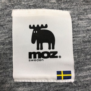 May include: White label with a black moose illustration and the text "moz sweden" with a registered trademark symbol. A small Swedish flag is in the bottom right corner.