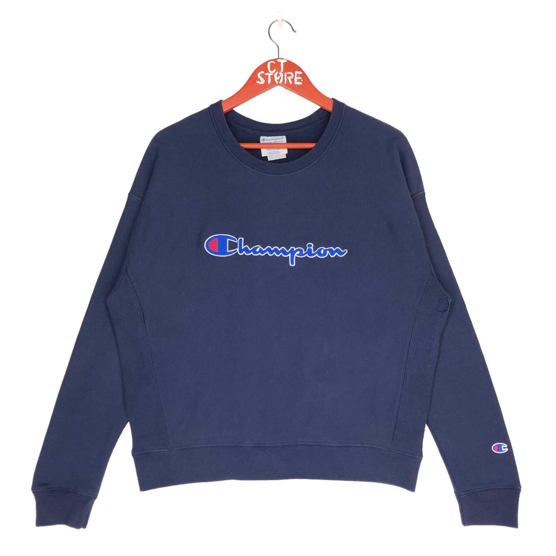 Vintage Champion Reverse Weave Sweatshirt: Blue Logo Crewneck