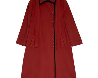 Abrigo vintage de Yves Saint Laurent: color naranja óxido, talla M.