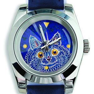 May include: A silver-toned wristwatch with a blue face featuring a detailed cat design. The cat has yellow eyes and a white and blue pattern. The watch has a blue leather band.