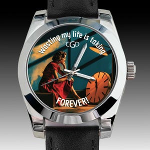 May include: Silver wristwatch with a black leather strap. The watch face shows a woman in a red dress, a clock, and the text "Wasting my life is taking FOREVER!" The watch hands are silver.
