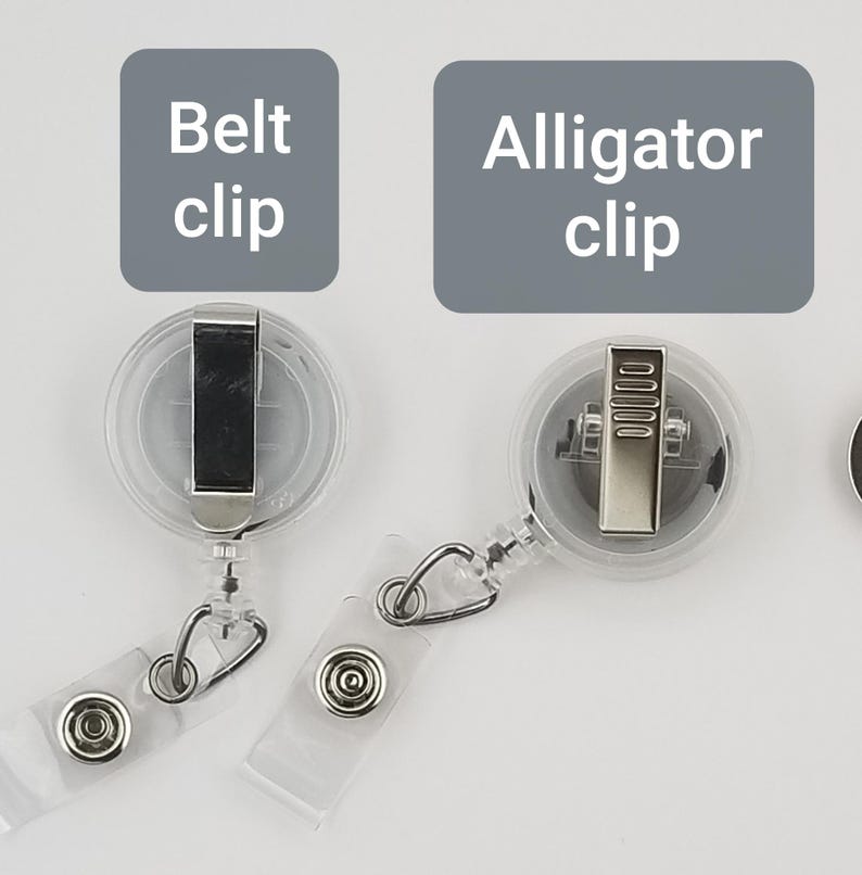 May include: Clear plastic retractable badge holders with metal clips. One has a belt clip, the other an alligator clip. The text on the image reads "Belt clip" and "Alligator clip".