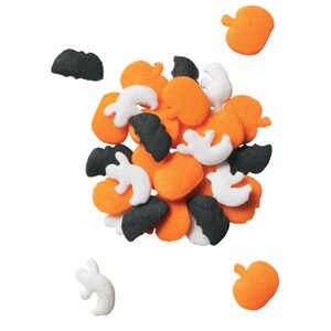 May include: A collection of Halloween-themed sprinkles in various shapes and colors. The sprinkles include orange pumpkins, white ghosts, and black bats. These festive decorations are perfect for adding a spooky touch to baked goods.