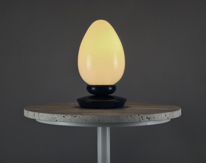 1980s Vintage Egg-Shaped Opal Glass Table Lamp With Wood Base By Massive Lighting.
