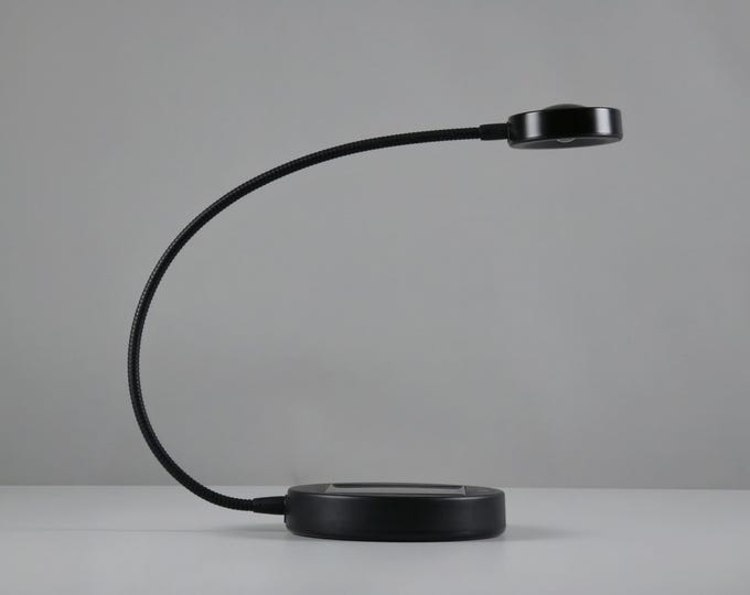 Contemporary Design 2010 IKEA Sunnan Solar Powered & Rechargeable LED Lamp By Nicolas Cortolezzis.