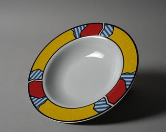 Studio Concept set van zeven porseleinen porseleinen borden met Memphis-design, postmodern ontwerp, jaren 1980.
