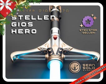 May include: A crossguard lightsaber hilt with a metallic gold and black finish, featuring a glowing blue blade emitter and a red activation button. The text 'STELLEN GIOS HERO' and 'SEAN SOLO SABERS' is visible alongside an Etsy Star Seller badge.