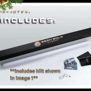 May include: A black box with the text "Sean Solo Sabers" on it. The box contains a white lightsaber blade and a hilt. The image text reads "Includes: **includes hilt shown in image 1**"