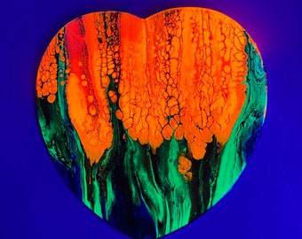 UV reactive painting on a heart shaped canvas. Original trippy acrylic paint pour canvas art. Neon/fluorescent wall art