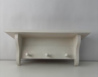 Vintage Wood Wall Shelf with Peg Hooks – Pink Tinted Off White Cottage Farmhouse Decor