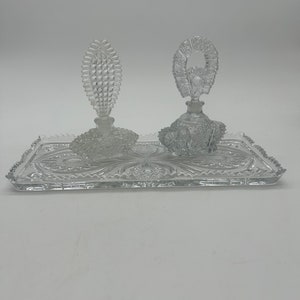 Vintage Pair of Crystal Cut Glass Perfume Bottles and Tray. One small chip on the top of one of the stoppers.