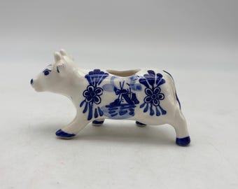 Vintage  Delft blue and white ceramic cow Toothpick Holder decorated with hand-painted Dutch windmill and floral patterns