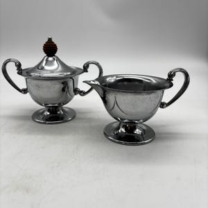 Vintage  Art Deco Style Chrome Finish with Wood Knob Sugar Bowl and Creamer.