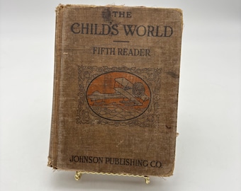 Antique 1917 hardcover book is "The Child's World: Fifth Reader" published by Johnson Publishing Company.