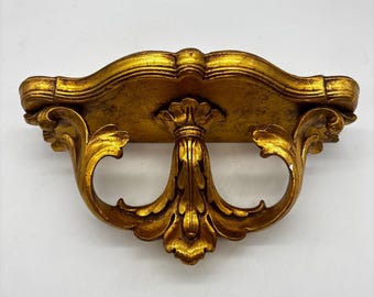 Vintage Mid Century Ornate Gold  Tone Hollywood Regency Style Ceramic Wall Shelf. Some imperfections