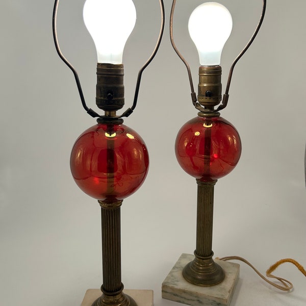 Pair of Antique Cranberry Glass Globe Table Lamps with Brass and Marble Base.