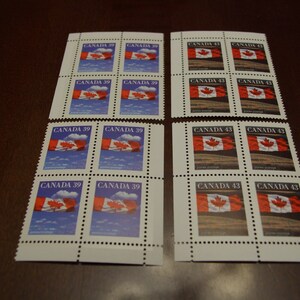 4 esquinas de bloque de placa sin usar con denominaciones de 39 centavos x 2, 43 centavos x 2.