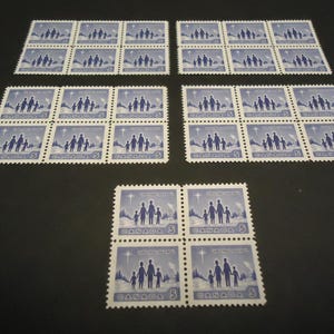 Conjunto de 28 sellos postales canadienses sin usar de 1964 - 5 centavos Familia en Navidad