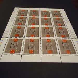 Hoja completa de 16 sellos postales canadienses sin usar, año 1999, 46 centavos. Logotipo del Colegio de Abogados de Quebec.