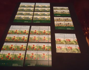 44 assorted mint Canadian postage stamps from 1991-1998 edible fruit 1,2,3and 5 cent denominations,