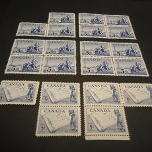 21 ongebruikte Canadese postzegels - 5 cent uit 1959 - standbeeld van La Veredrye en 5 cent David Thompson en kaart - uit 1957