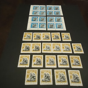 36 sellos postales canadienses nuevos - 1968. Tallas de esteatita inuit de Navidad, familia esquimal y madre e hijo - 5,6 centavos.