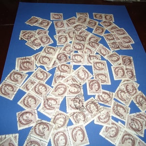 100 sellos postales canadienses usados de 1954, de 1 centavo, color marrón, de la Reina Isabel II