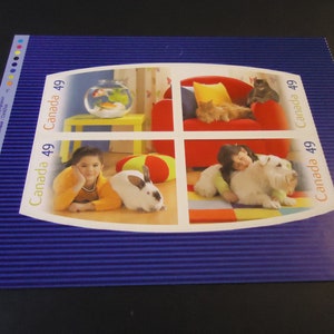 4 sellos postales canadienses nuevos de 2004: Mascotas