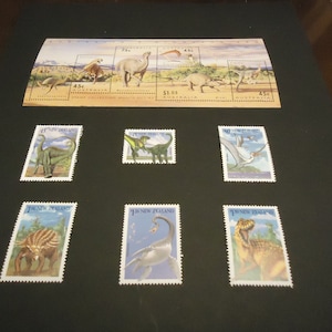 Hoja conmemorativa de Mint Australia y 6 sellos postales de dinosaurios de Nueva Zelanda de 1993