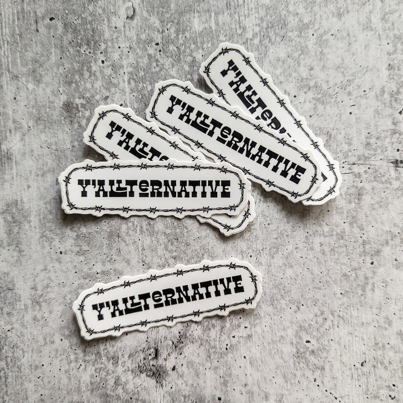 May include: A set of five white stickers with black barbed wire borders and the text "Y'allternative" printed in black.