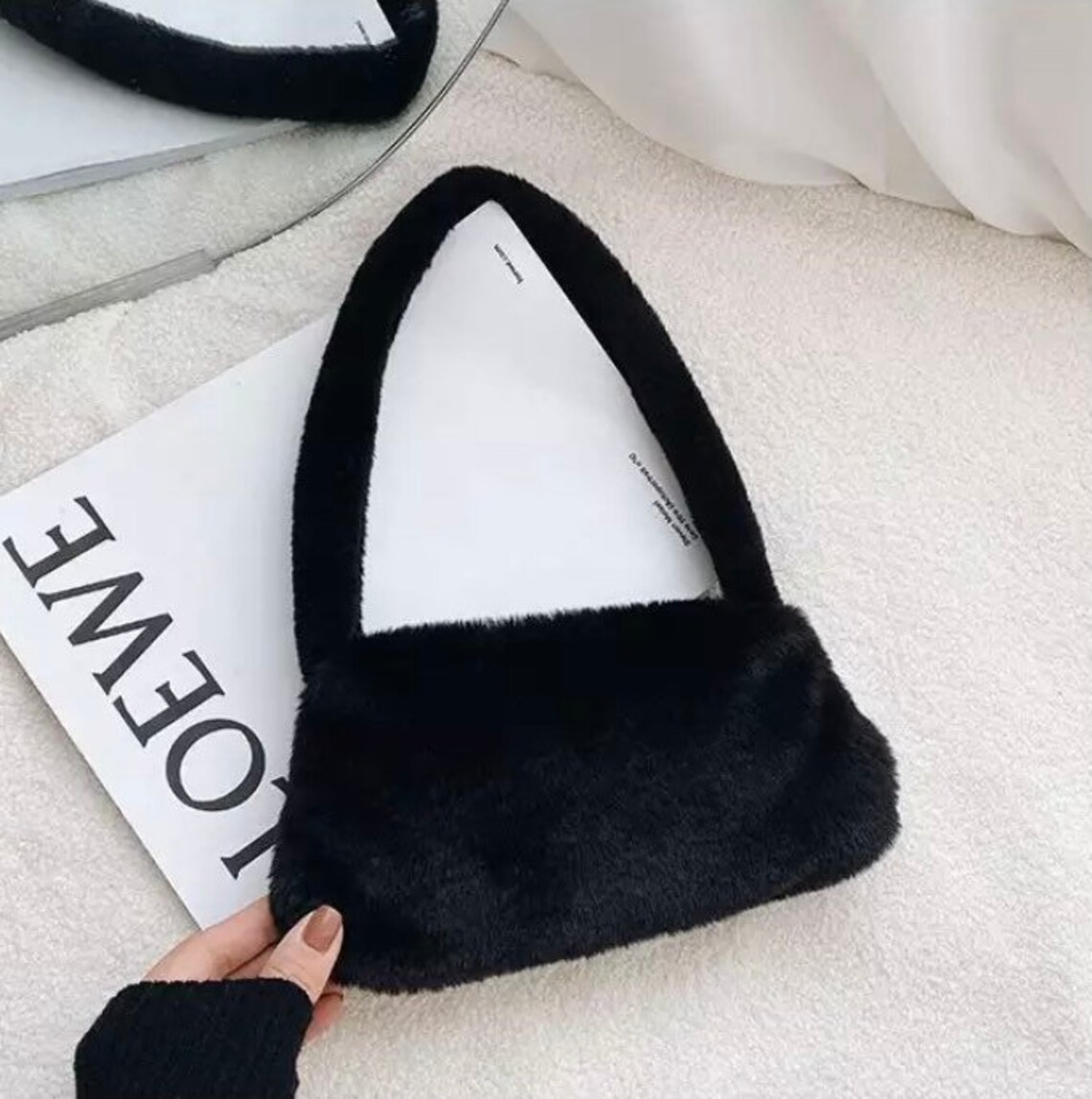 small black fluffy bag