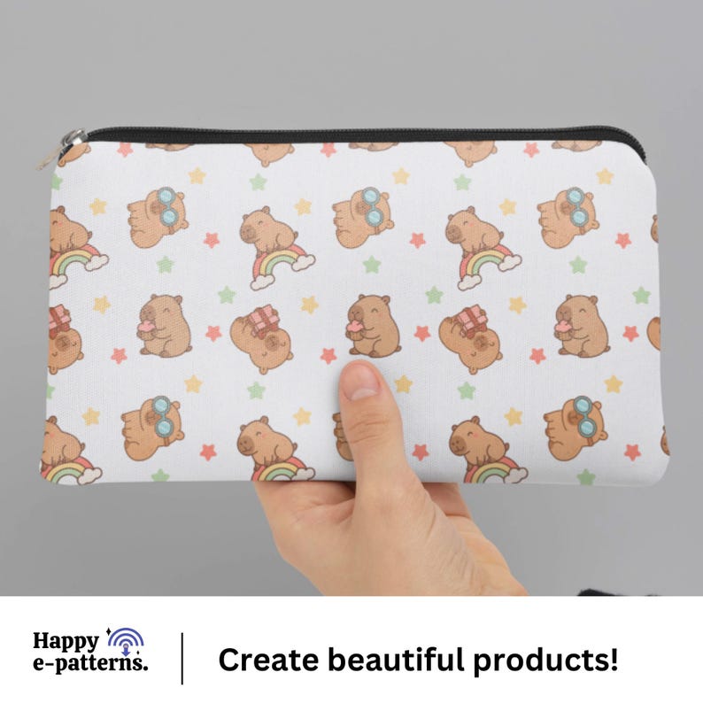 May include: White zippered pouch featuring a repeating pattern of cartoon bears with sunglasses, rainbows, and gifts, interspersed with colorful stars. The pouch is held by a hand. Text at the bottom reads "Create beautiful products!"