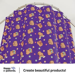 May include: A purple shower curtain featuring a repeating pattern of cartoon wombats, rainbows, and stars in various colors. The wombats are depicted with different accessories. The text "Happy e-patterns. | Create beautiful products!" is at the bottom.