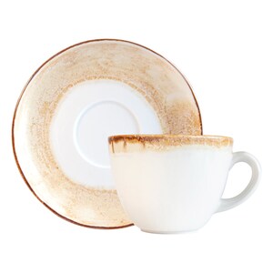 May include: A white ceramic coffee cup and saucer with a brown and beige glaze. The cup has a rounded shape and a handle. The saucer has a slightly raised rim.