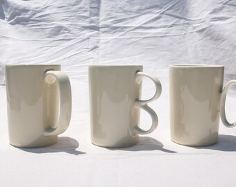 Handmade Porcelain Coffee Mug: Mustard Glaze, Unique Handle