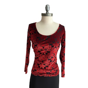 Flamenco top velvet pattern on transparent fabric.