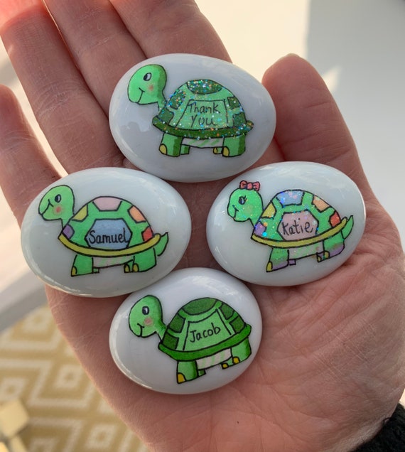 A hand-carved tortoise worry stone you can personalize — 185 favorites confirms people genuinely feel something when they hold this little guy.
