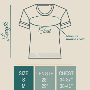 May include: A size chart for unisex t-shirts, showing measurements in inches for chest and length. The chart includes sizes S, M, L, XL, and 2XL.