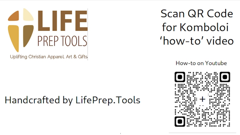 May include: A brown and gold cross logo with the text "LIFE PREP TOOLS" and the tagline "Uplifting Christian Apparel Art & Gifts". The text "Handcrafted by LifePrep. Tools" is below the logo. A black and white QR code is on the right side of the image with the text "Scan QR Code for Komboloi 'how-to' video" and "How-to on Youtube".