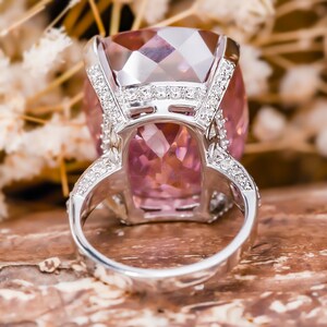 A PINK DIAMOND CLUSTER RING In 18ct White Gold, Set With A Cushion Cut Pink Diamond Of 071 Carats 64184d6c74334 Full 43692200 1679314288