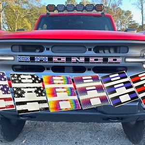 Bronco Vinyl Grille Letters Overlay Fits: 2021+ Ford Bronco Full Size Models. Custom USA, Tie Dye, Cheetah, Thin Blue Line Free Shipping.