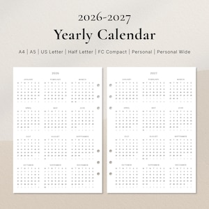 May include: A yearly calendar for 2026-2027, printed on white paper. The calendar includes the years 2026 and 2027, with each month displayed in a grid format. The text "Yearly Calendar" is at the top.