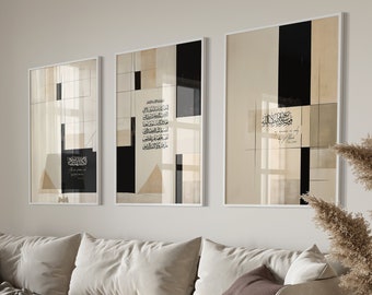 May include: Three framed abstract art prints with geometric shapes and Arabic calligraphy in black and white on a beige background. The prints are hanging on a white wall above a beige sofa.