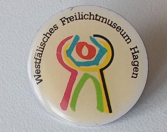 Wearable History – Enamel Promo Lapel Pin from Hagen Museum