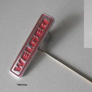 WELGER pin - vintage agricultural technology