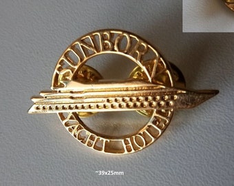 Sunborn Yacht Hotel Pin: Golden Elegance - 90s Era