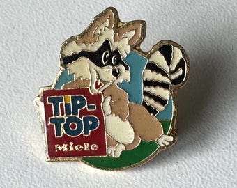 Rare Miele TIP‑TOP pin – fun raccoon mascot for collectors