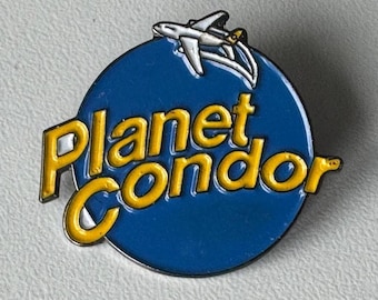 Planet Condor pin – rare airline souvenir with airplane motif