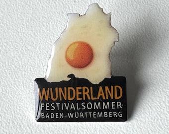 Wunderland Festival Summer – Baden‑Wuerttemberg Souvenir Pin with Fried Egg Design