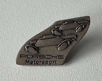 Porsche motorsport pin – racing design with two cars and Porsche Motorsport logo